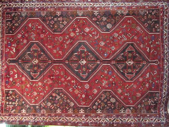 Appraisal: CARPET An oriental geomertic room sized carpet having three black