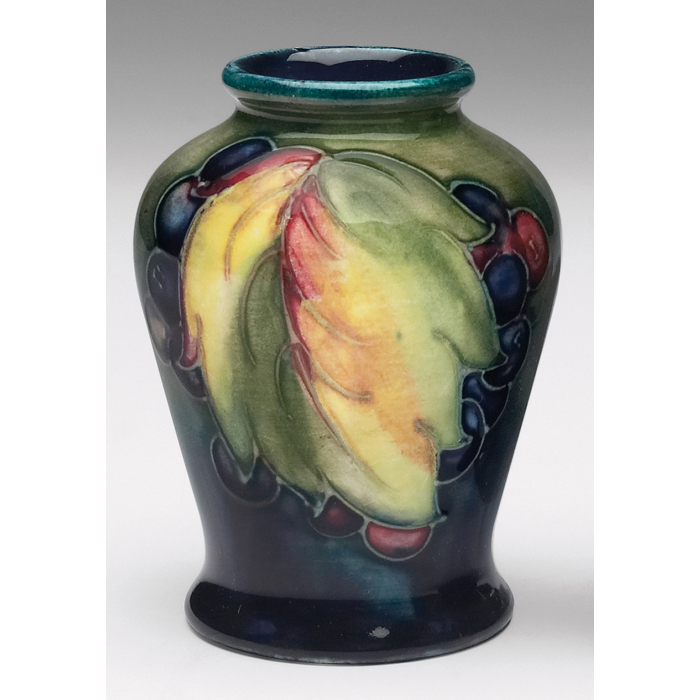 Appraisal: Moorcroft vase grape leaf and berry impressed mark painted signature