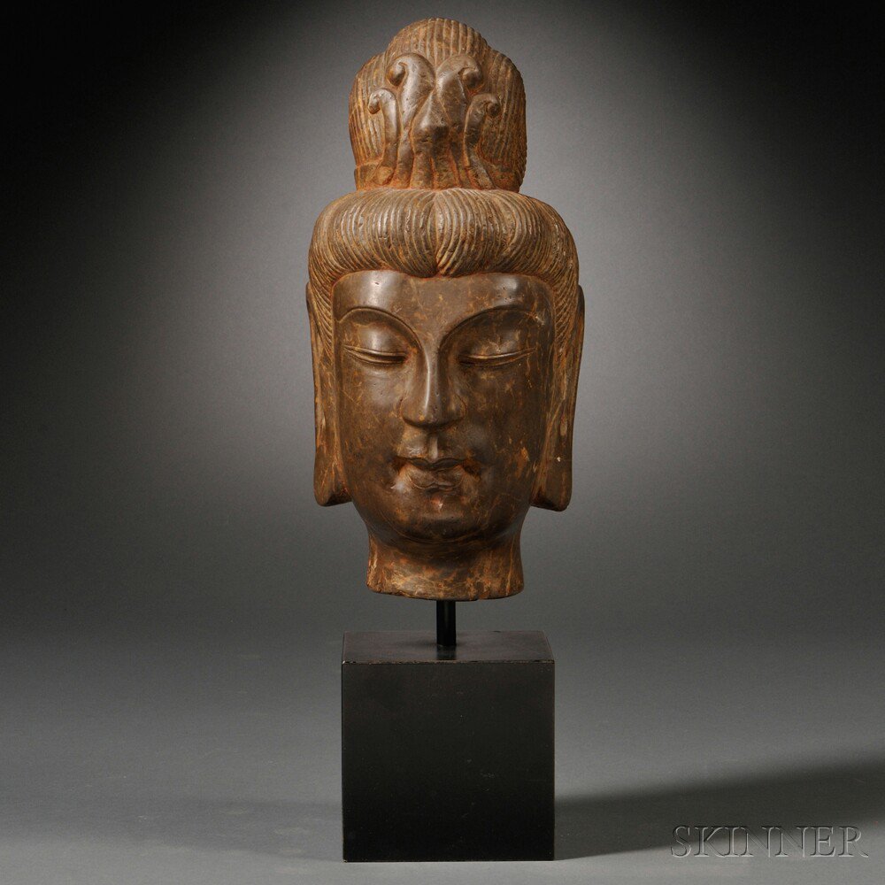 Appraisal: Stone Buddhist Head China with downcast eyes and a faint