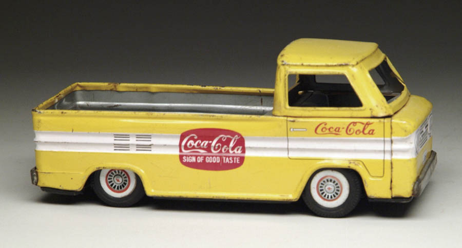 Appraisal: COCA-COLA FRICTION TRUCK Yellow pickup truck with Coke logo on