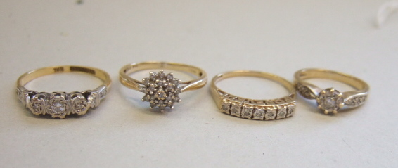 Appraisal: A gold and platinum diamond set three stone ring detailed