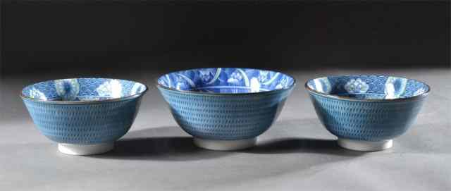 Appraisal: Japanese Porcelain BowlsFooted glazed porcelain bowls with floral interiors and