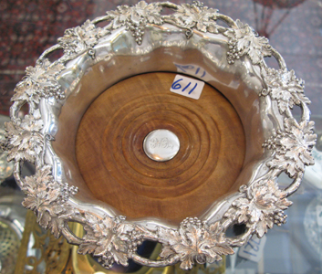 Appraisal: AN ENGLISH SHEFFIELD TH CENTURY WINE COASTER in silverplated vintage