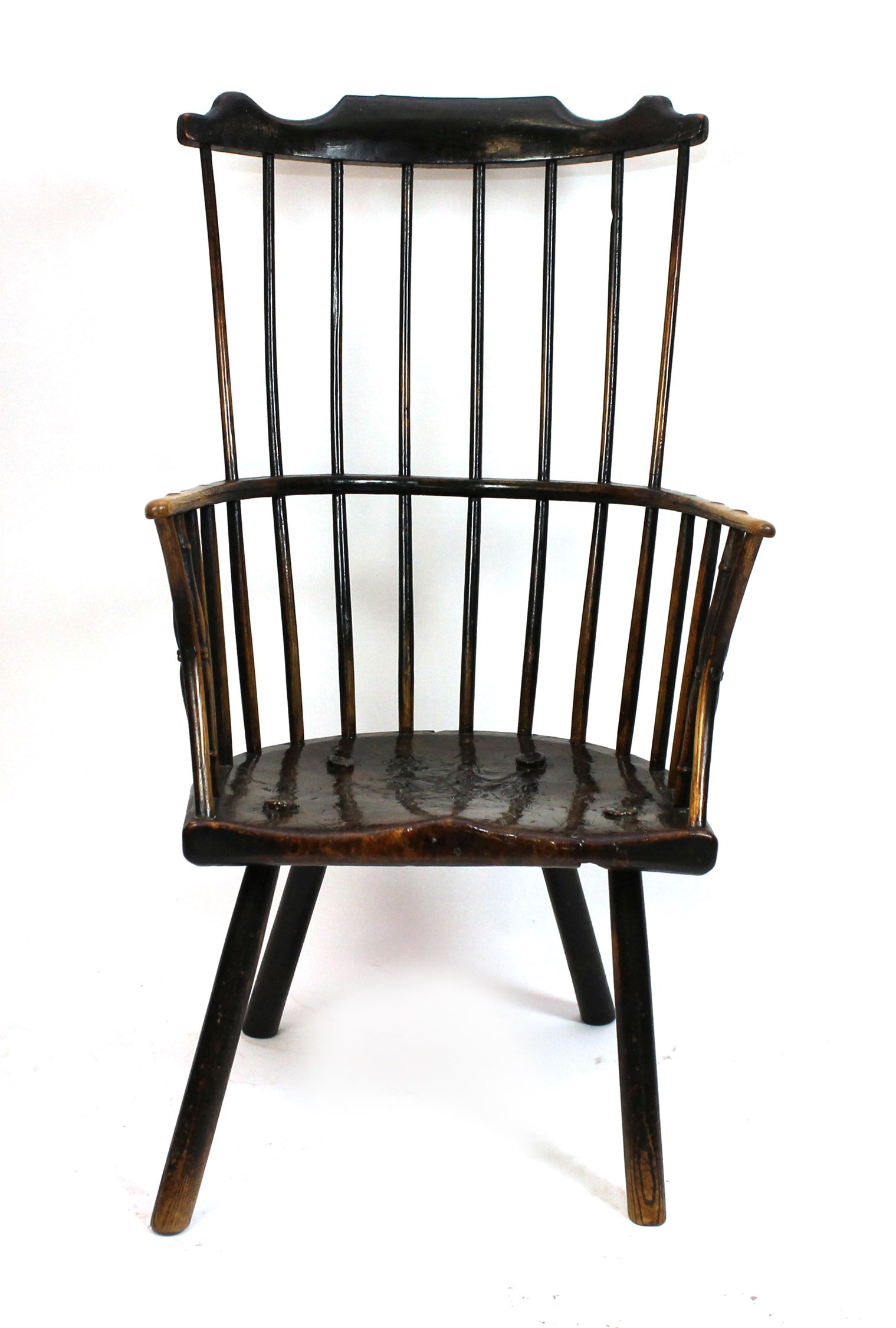 Appraisal: An th century elm and ash comb back Windsor chair