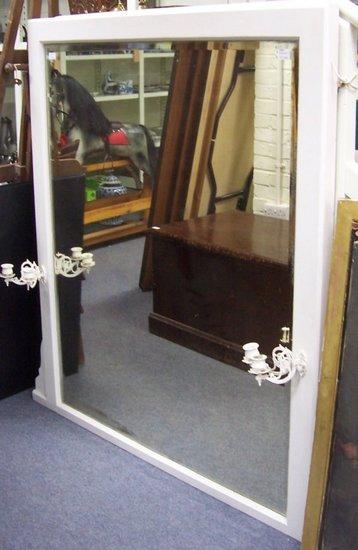 Appraisal: A late th Century white painted overmantel mirror with twin