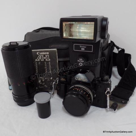 Appraisal: Canon A- mm Camera Outfit Lenses This is for a