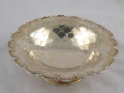 Appraisal: A silver tazza with fishscale decoration and shaped stiffened rim