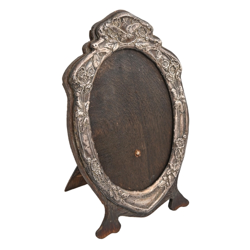 Appraisal: An Edwardian Art Nouveau silver mirror or photograph frame the