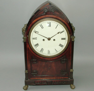 Appraisal: A composite mahogany cased lancet shaped bracket clock the eight