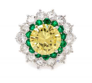 Appraisal: A Platinum Fancy Intense Yellow Diamond Diamond and Emerald Ring