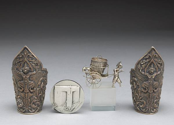 Appraisal: Property of another owner Comprising fine silver ingot Siamese pair