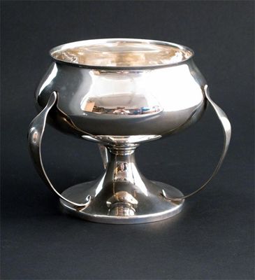 Appraisal: A Charles Edwards silver cup tapering circular foot supporting shouldered