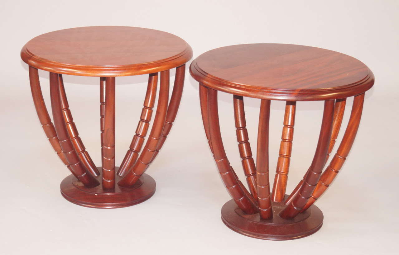 Appraisal: A pair of modern occasional tables the circular top on