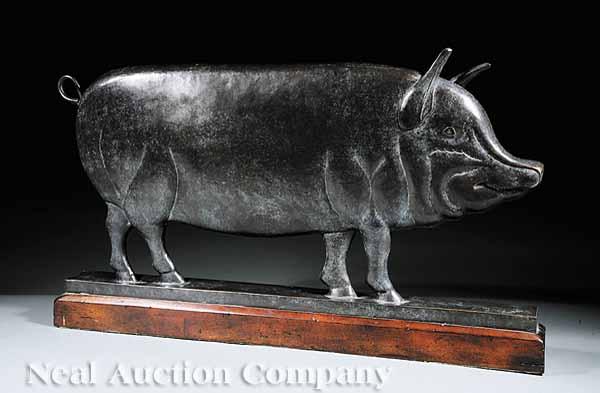 Appraisal: An American Hammered Brass Pig on mahogany base height in