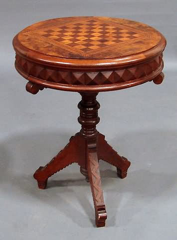 Appraisal: Inlaid exotic mixed wood circular top with checkerboard faceted apron