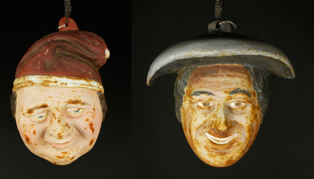 Appraisal: - Two Whimsical Cast Iron Faces Two whimsical cast iron