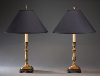 Appraisal: Brass candlestick table lamps with fabric shades Pair of brass