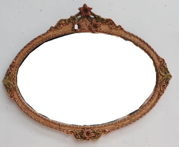 Appraisal: An elliptical wall mirror the polychrome painted frame carved with