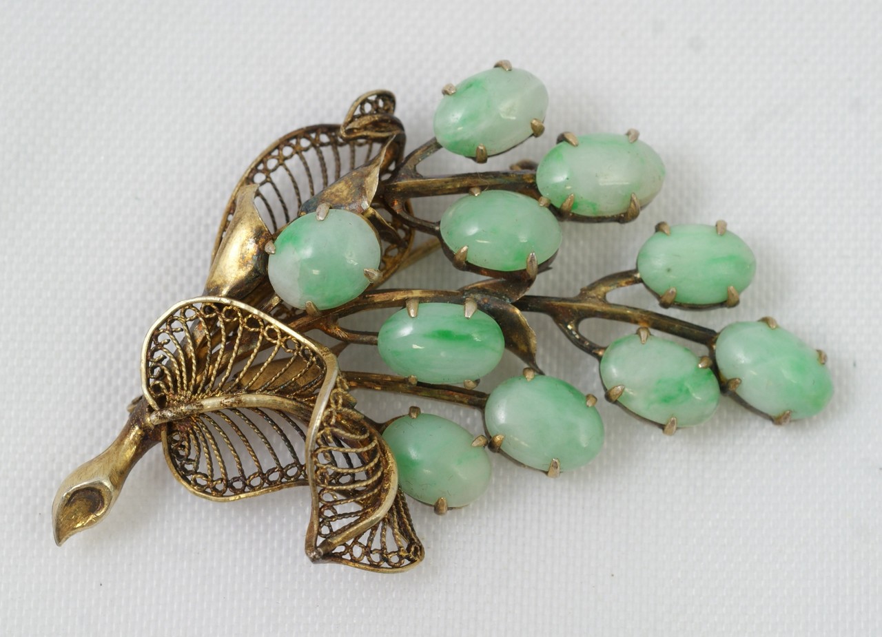 Appraisal: Silver gilt grape cluster set with green jade grapes x