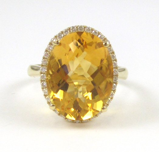 Appraisal: CITRINE DIAMOND AND FOURTEEN KARAT GOLD RING with round-cut diamonds