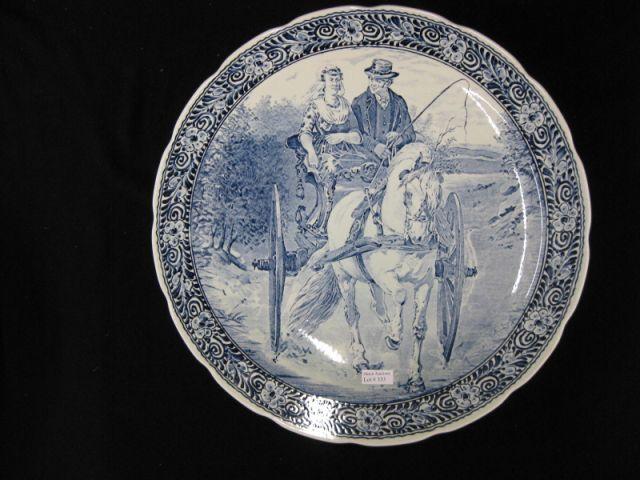 Appraisal: Boch Delft Pottery Charger couple in horse drawn wagon excellent