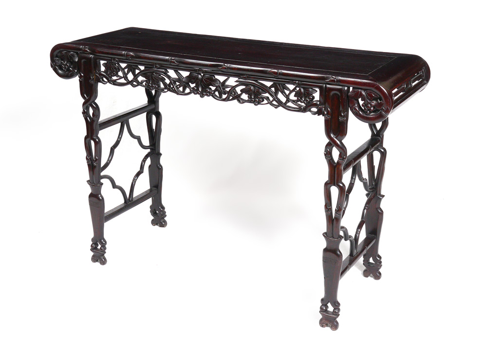 Appraisal: CHINESE CARVED ALTAR TABLE Top with carved scroll ends pierced