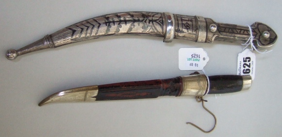 Appraisal: A silver mounted Jambiya with curved blade cm and a