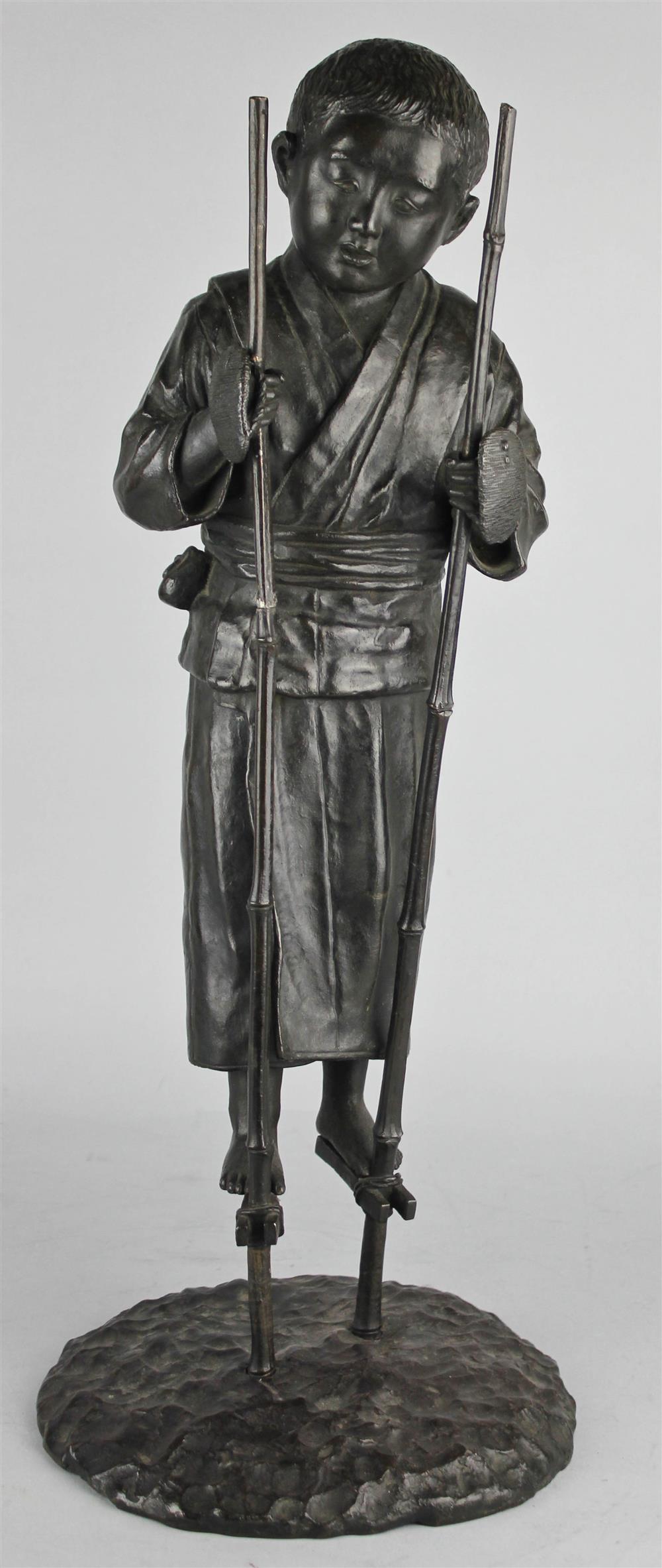 Appraisal: JAPANESE BRONZE FIGURE OF A YOUNG BOY ON STILTS MEIJI