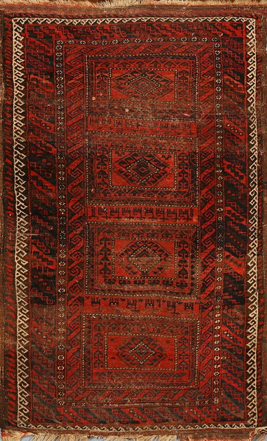 Appraisal: A BELOUCH WINE GROUND RUG with four central rectangular panels