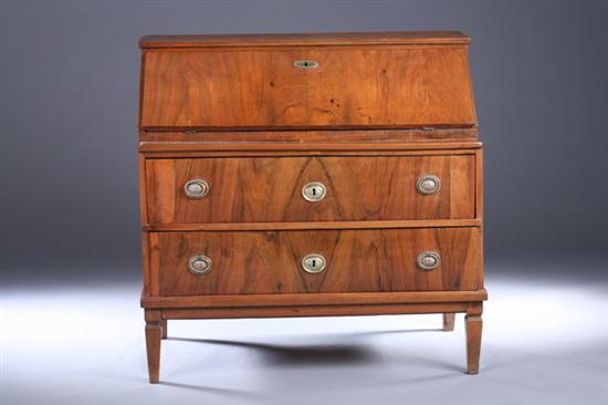 Appraisal: CONTINENTAL WALNUT SLANT-FRONT DESK th century Hinged lid opening to