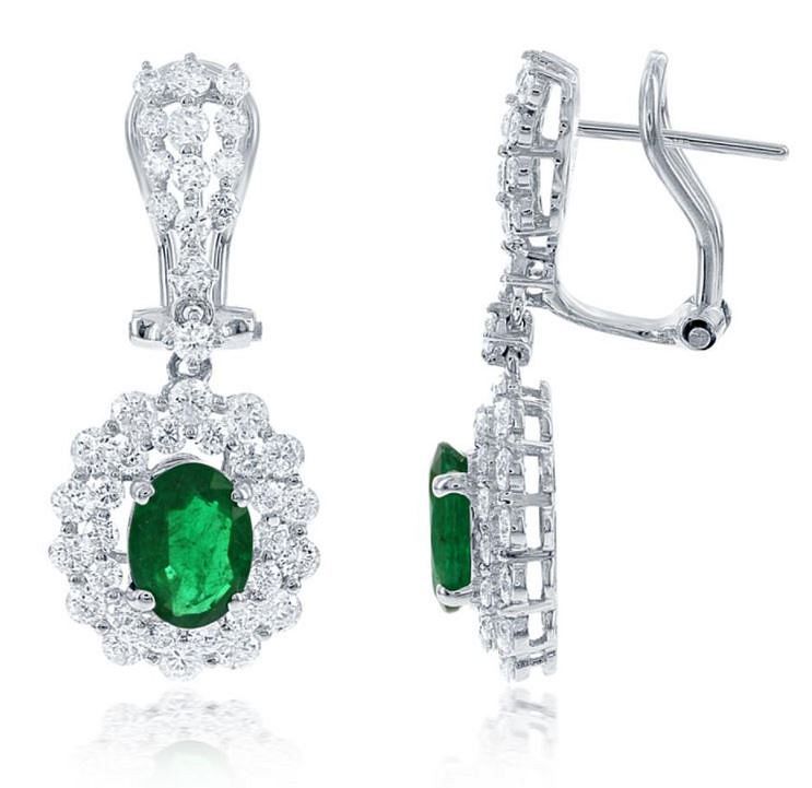 Appraisal: EMERALD AND DIAMOND EARRING EMERALD AND DIAMOND EARRING A delicate