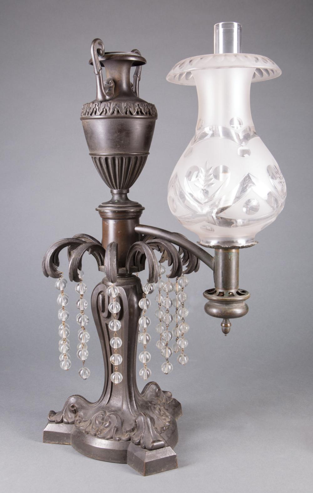 Appraisal: English Bronze Single-Arm Argand Lamp c standard surmounted by an