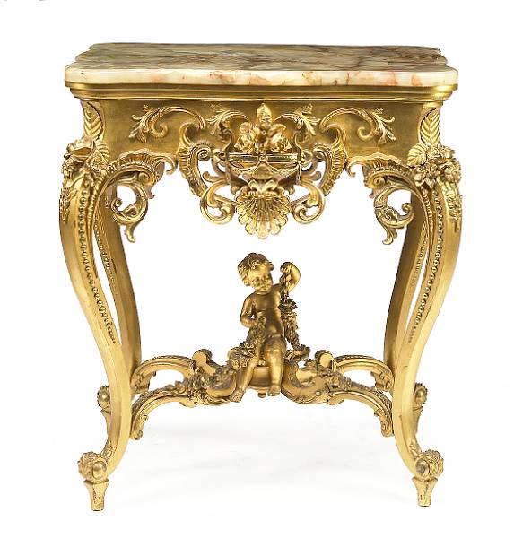 Appraisal: A Louis XV style giltwood table with onyx top height