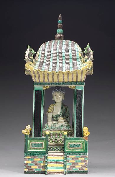 Appraisal: An assembled three-color biscuit glazed porcelain seated Buddha and two-section