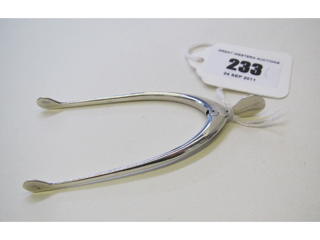 Appraisal: Pair of silver tongs modelled as a wishbone Birmingham