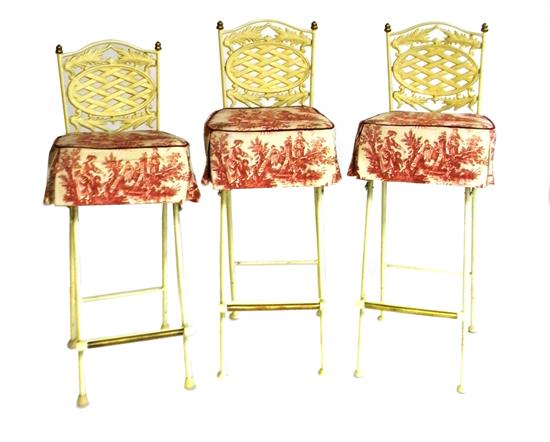 Appraisal: Three cast-metal counter stools painted off white brass finials and