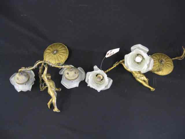 Appraisal: Pair of Figural Brass Cherub Hanging Lights double sconce with