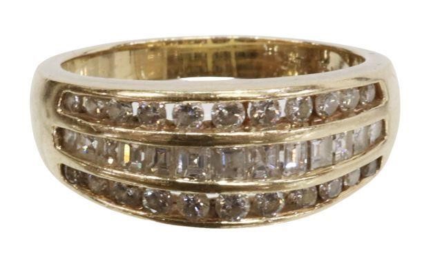 Appraisal: Estate kt yellow gold ring three rows of channel-set diamonds