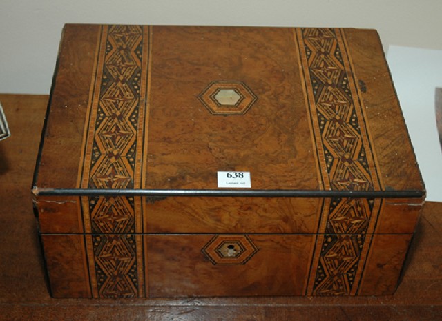 Appraisal: A VICTORIAN BURR WALNUT AND MARQUETRY SEWING BOX The hinged