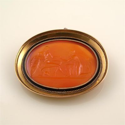 Appraisal: A large intaglio brooch The well carved cornelian oval section