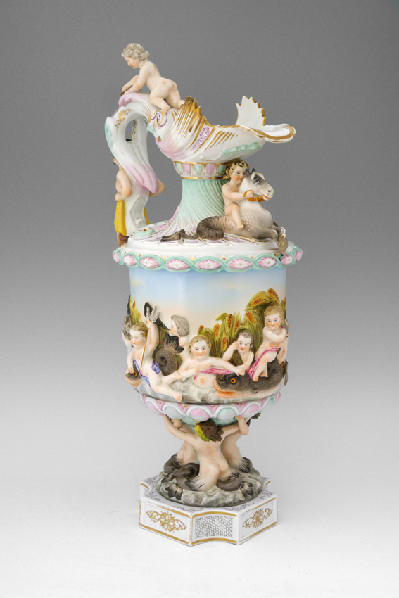 Appraisal: CONTINENTAL PORCELAIN FIGURAL EWER Over the top decoration with putti