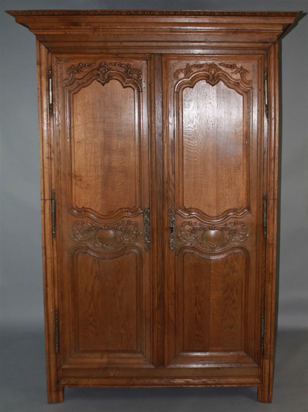 Appraisal: TH C FRENCH PROVINCIAL CARVED WALNUT ARMOIRE OF LARGE PROPORTIONS