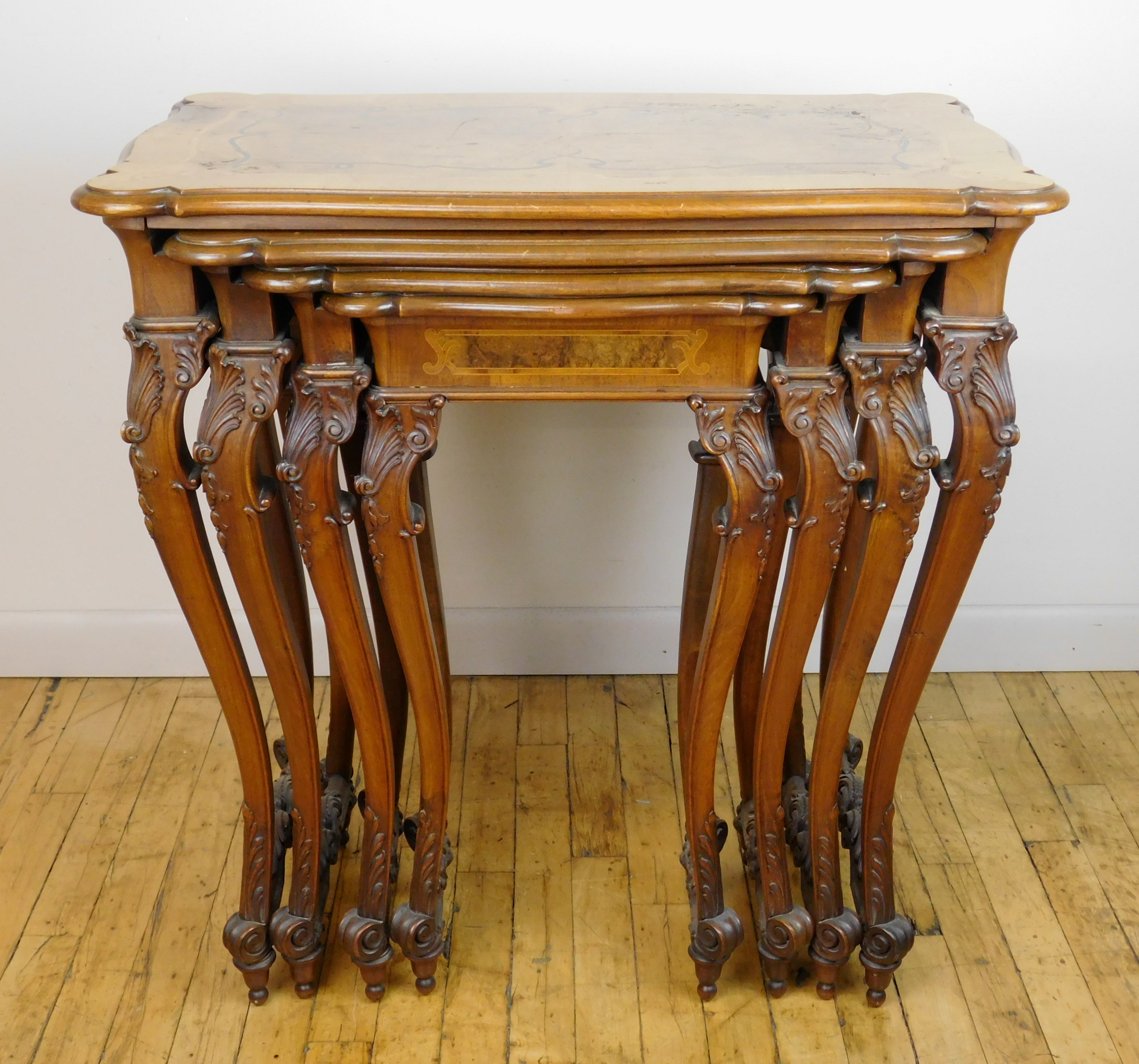 Appraisal: Set of Austrian nesting tables carved legs and stretchers in-laid