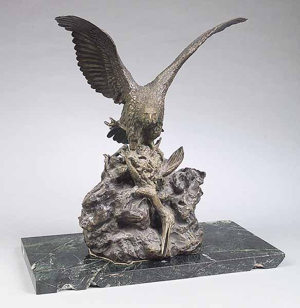 Appraisal: A French Bronze Group of an Eagle Feeding on a