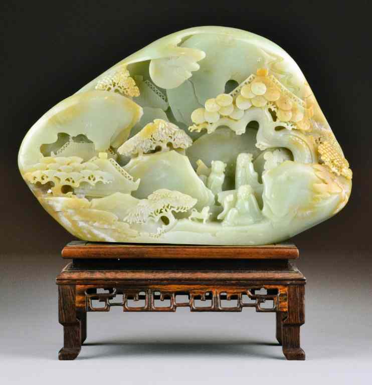 Appraisal: Large Chinese Jade Carved Boulder with StandCarved light green to