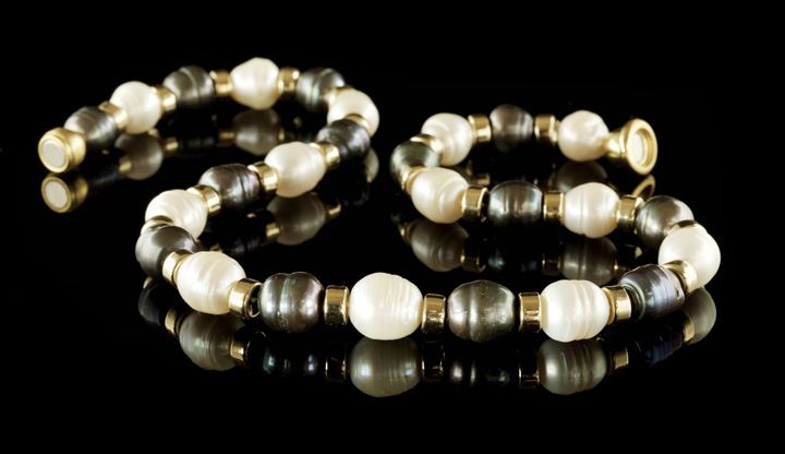 Appraisal: Dramatic Single Strand of Black and White Baroque Cultured Pearls