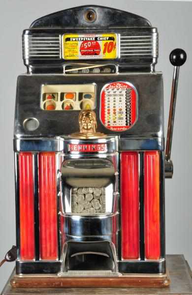 Appraisal: Jennings Sweepstake Chief Slot Machine Description With red light-up plastics