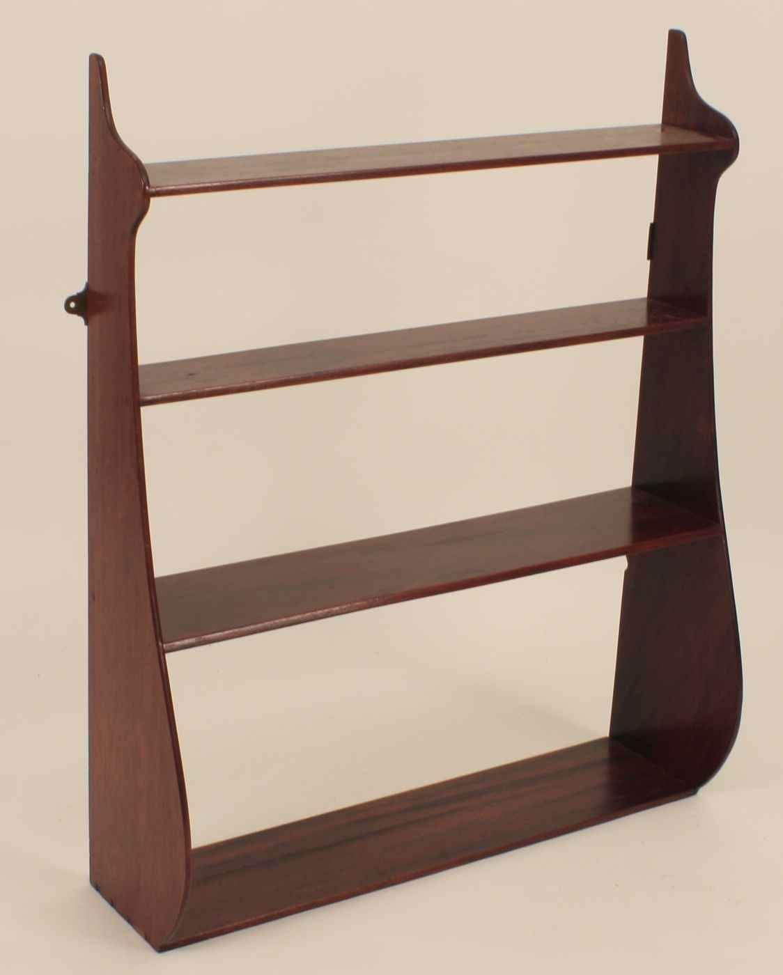 Appraisal: EARLY AMERICAN WHALEBACK GRADUATED SHELF th CenturyIn mahogany with dovetail