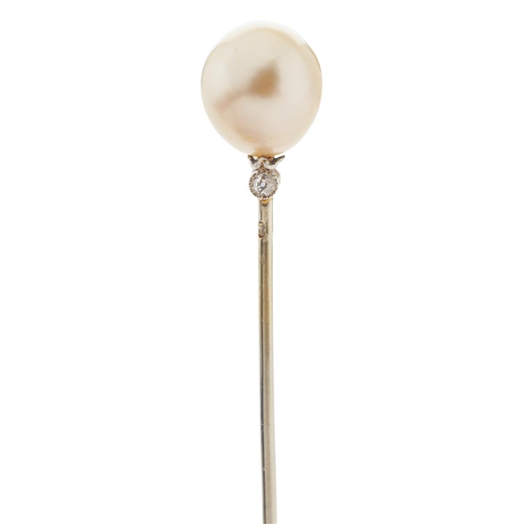 Appraisal: An early th century natural pearl and diamond set stick