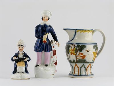 Appraisal: A Prattware jug moulded with a farmer and his wife